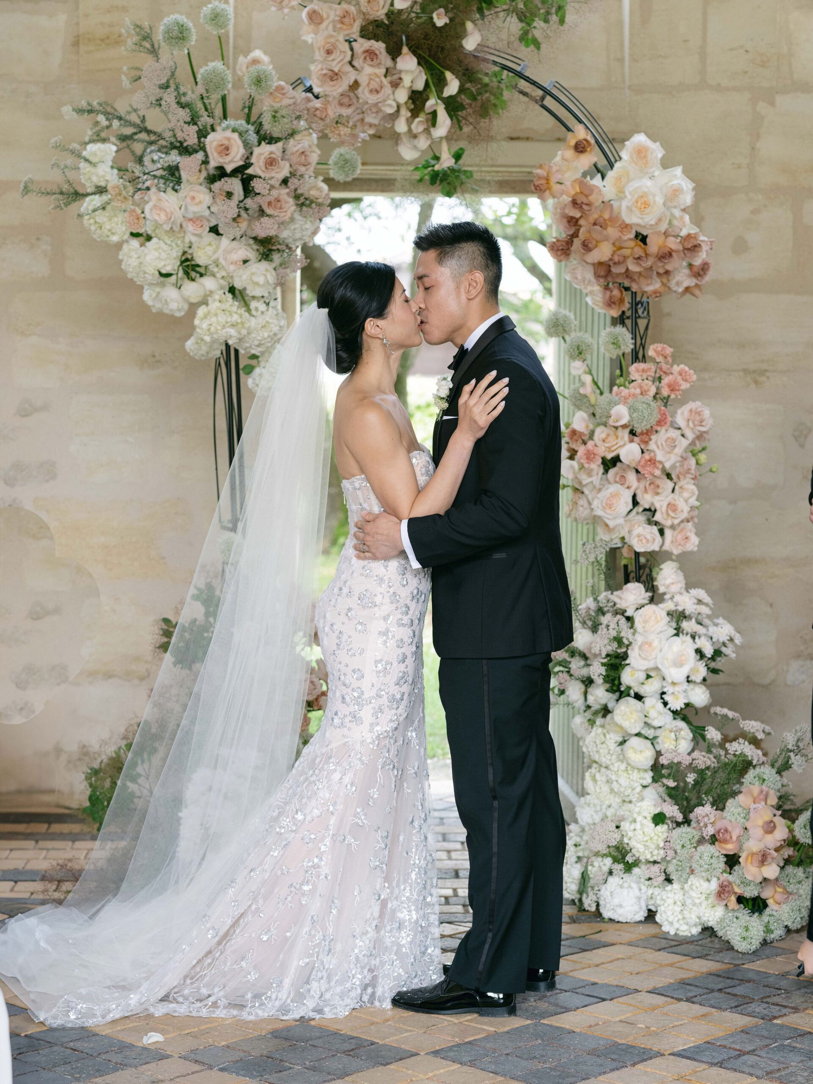Chateau Gassies Ceremony First Kiss Floral Arch Romantic Intimate