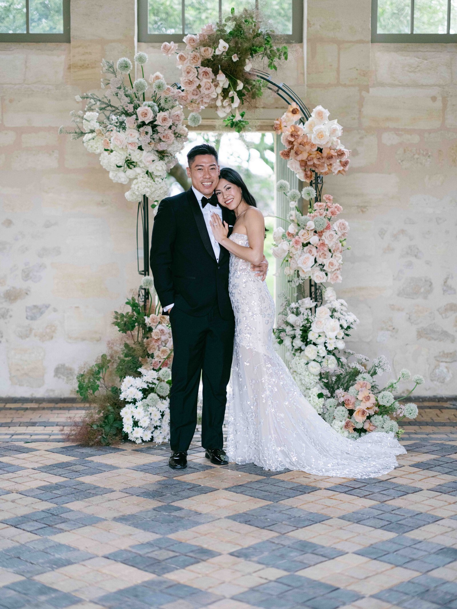 Chateau Gassies Portraits Couple Circular Floral Arch Blush Roses Soft Light