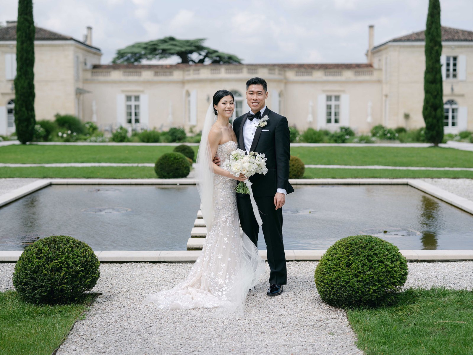 Chateau Gassies Portraits Couple Formal Gardens Reflecting Pool Soft Overcast