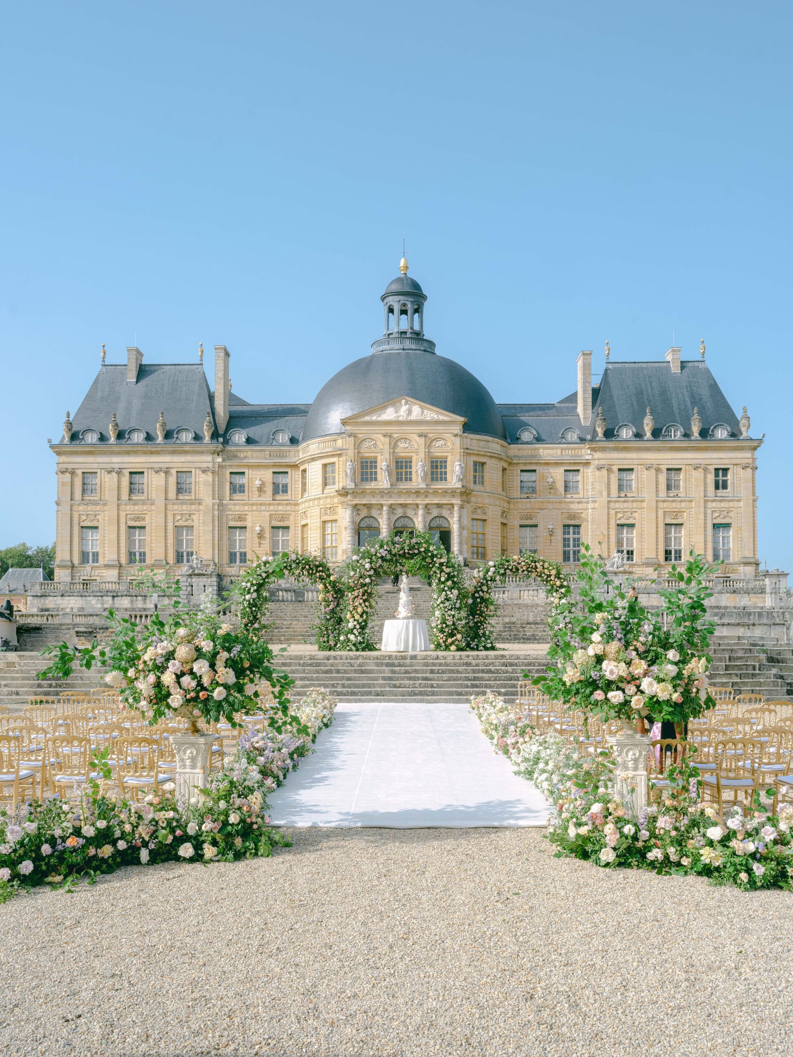 Chateau Vaux Le Vicomte Ceremony Setup Dome Baroque Golden Hour Floral Arch