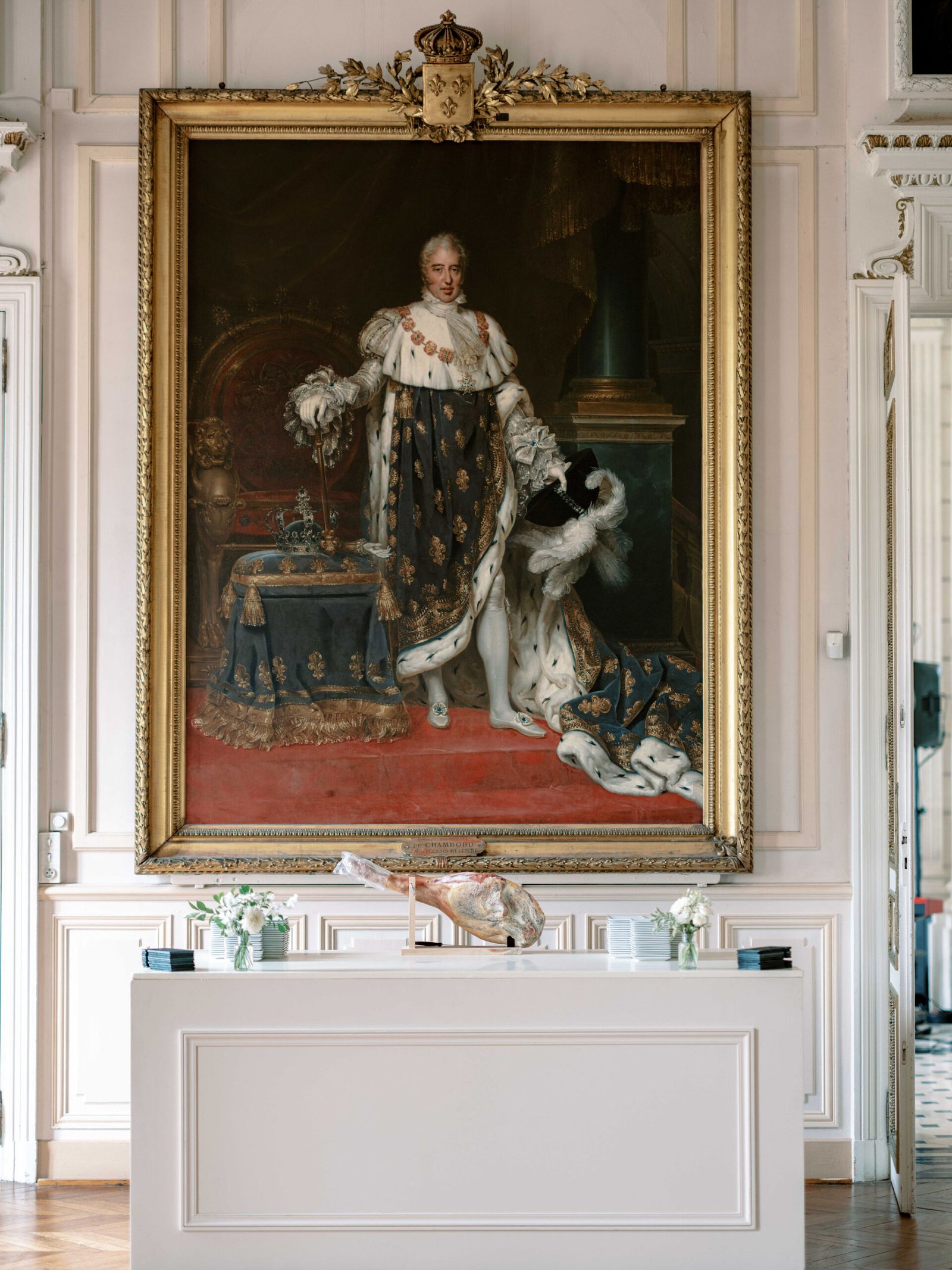 Chateau de Baronville portrait gallery with Louis XVI frame and golden light