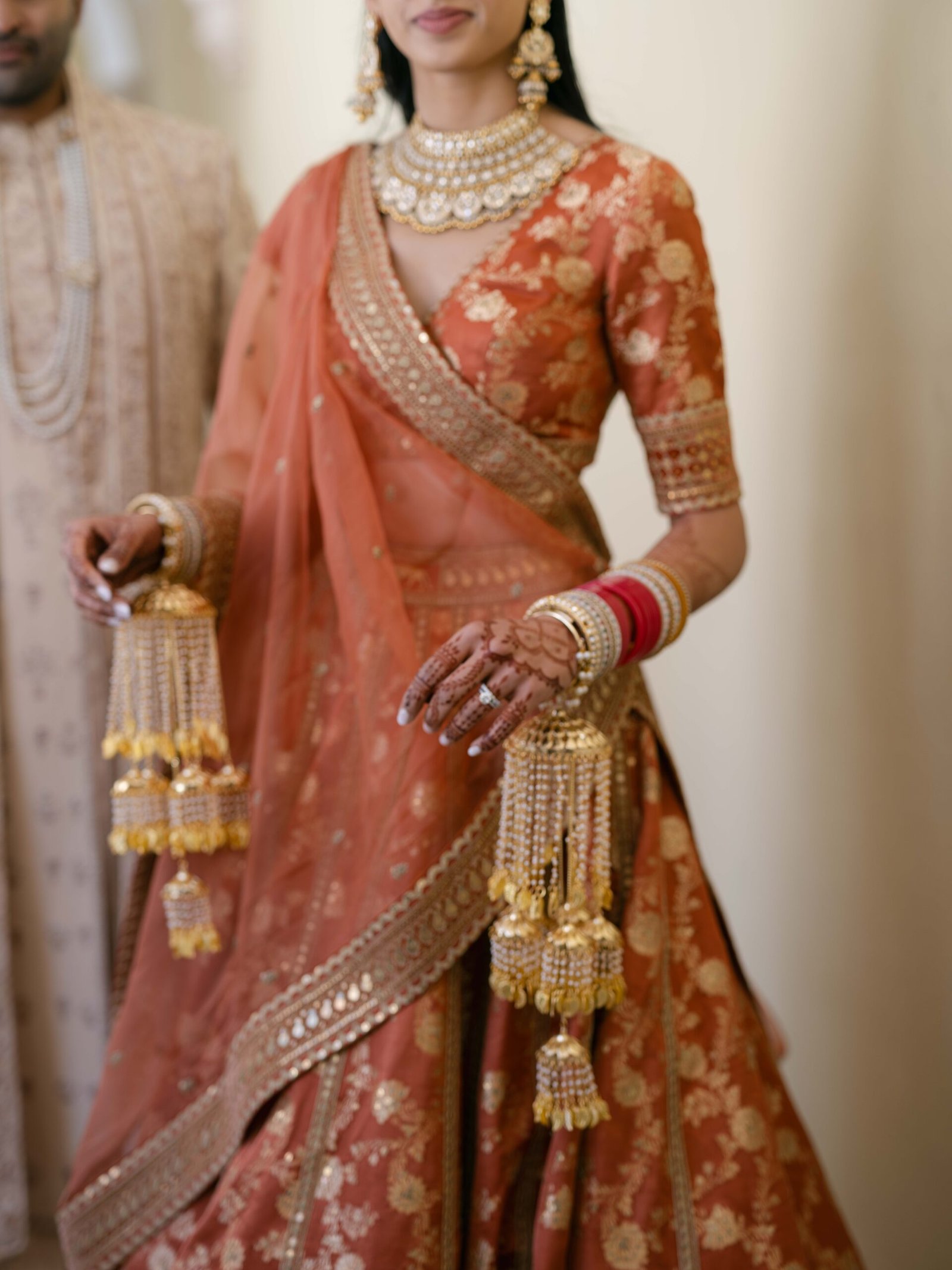 Indian bride's jewelry and kaleere while getting ready in Lisbon, soft afternoon light