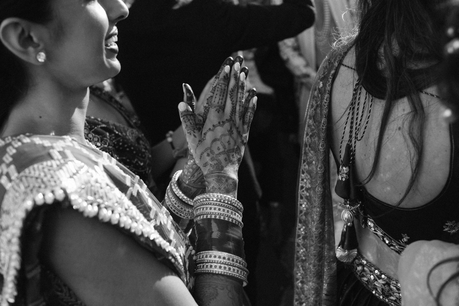 Bride's mehendi hands by candlelight, Indian wedding in Lisbon